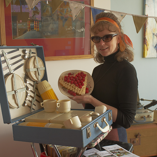 linda with the heart-shaped cake