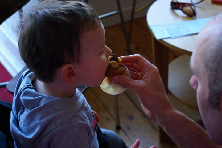 little boy eating cake