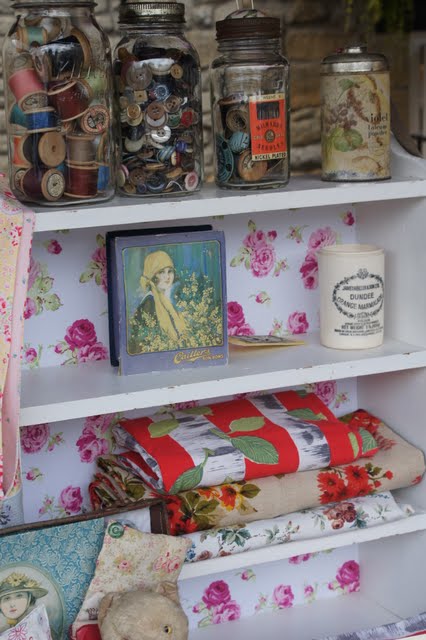 Vintage and handmade items on a shelf